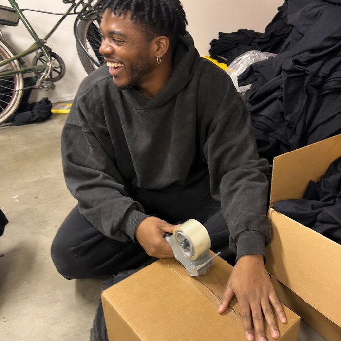 Seller packing an order